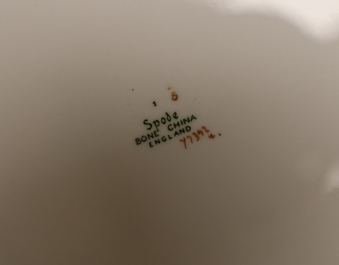 A Spode green and gold banded dinner set